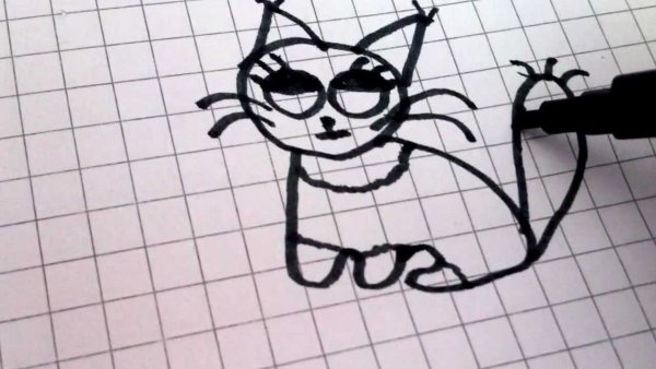 Котенок черным маркером