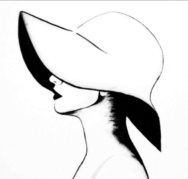 Женщина в шляпе в профиль