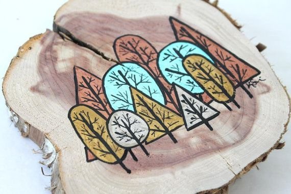 Детские рисунки на спилах дерева