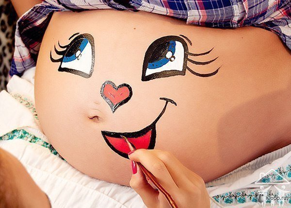 Рисование на животе беременных