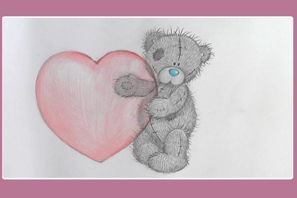 Мишка держит сердечко