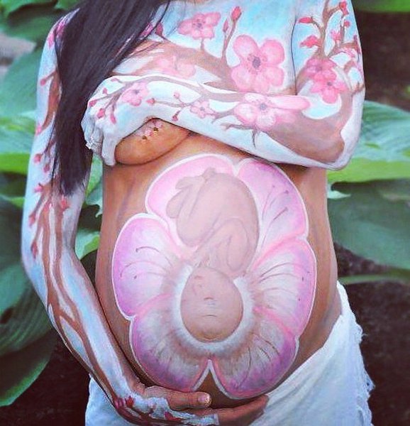 Арт на животе беременной
