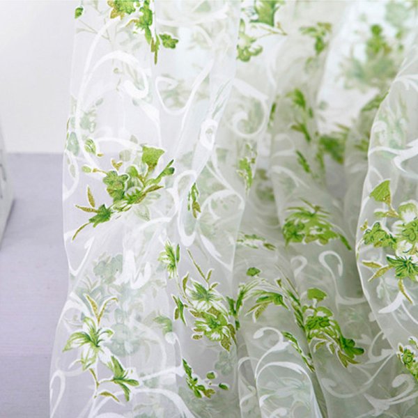 Тюль с зеленой вышивкой