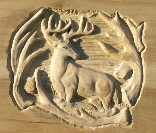 Плоскорельефная резьба по дереву бык