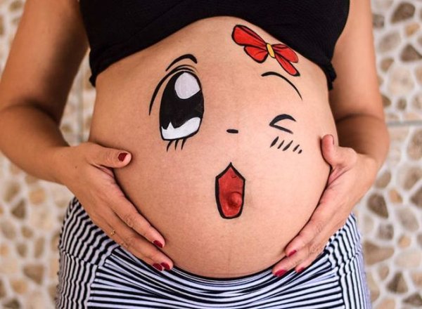Рисунок на животе беременной