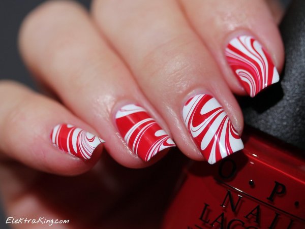 Красные ногти с белым узором
