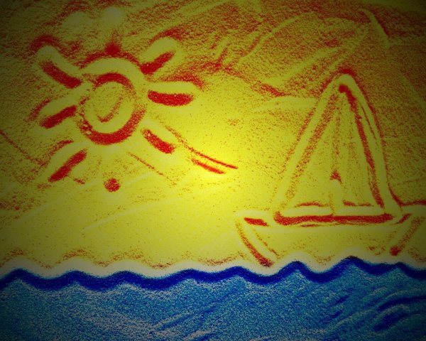 Рисование песком корабля