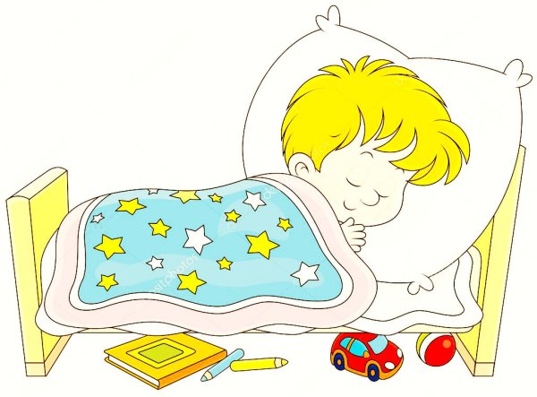 Мальчик спит в кровати