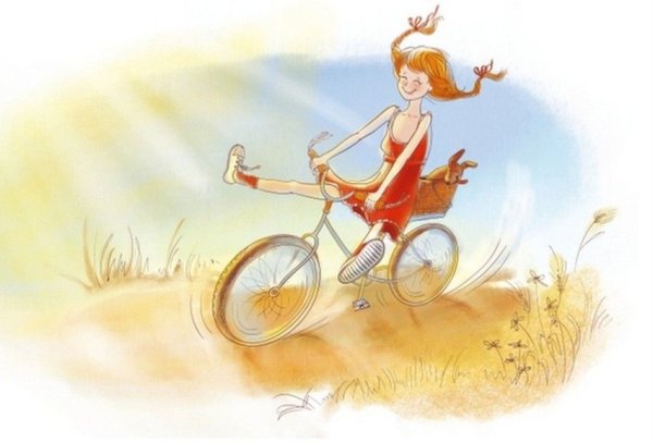 Счастливая девочка едет на велосипеде