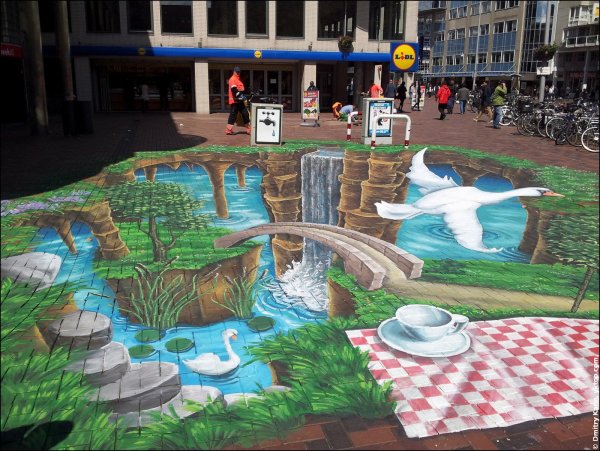 Стрит-арт на асфальте