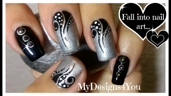 Чёрный маникюр с серебряным рисунком
