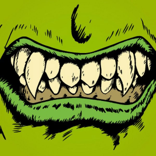 Челюсть с зубами и клычками