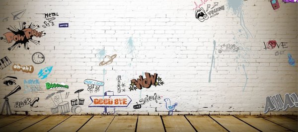 Граффити на белой кирпичной стене