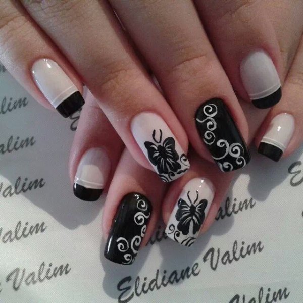 Белые ногти с черным рисунком