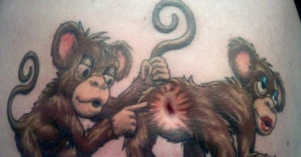 Татуировка обезьяна на пупке