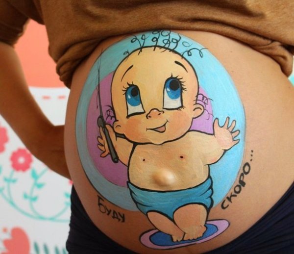 Рисунок на животе беременной