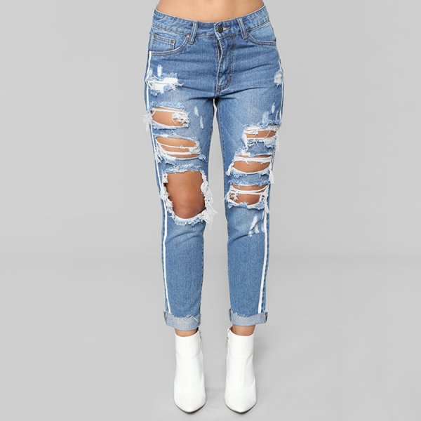 Рваные джинсы женские