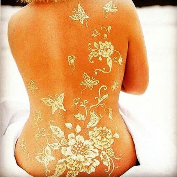 Белое мехенди на спине