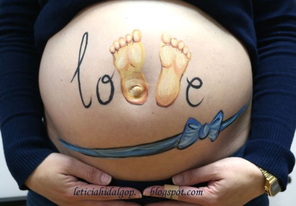 Рисование на животе беременных